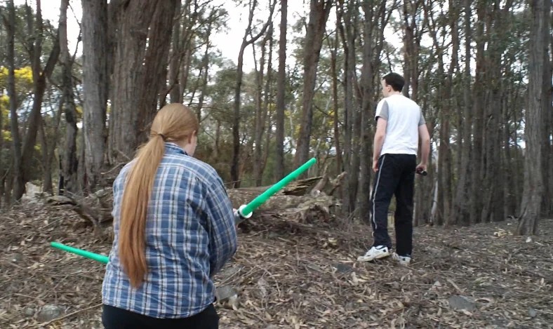 Kyle Nash and Dean Walters rehearse their lightsaber duel moves before filming KNN Episode 9